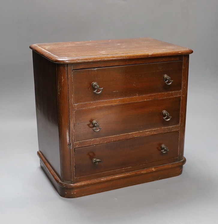 Two Victorian mahogany table top miniature chests of drawers, largest 39 cms wide x 38 cms high.